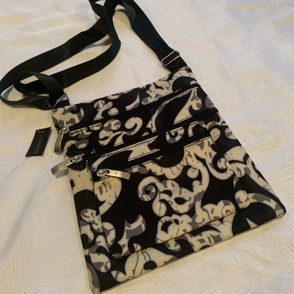 Cross body vinyl bag - Tag says “by chance”